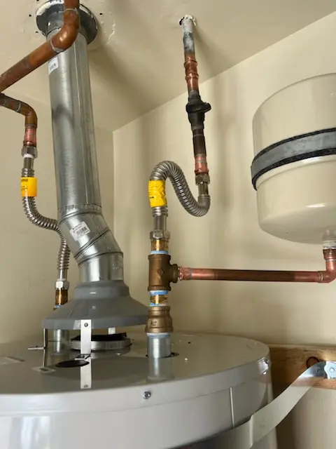 Water heater installation and plumbing repair in Lowell Mill
